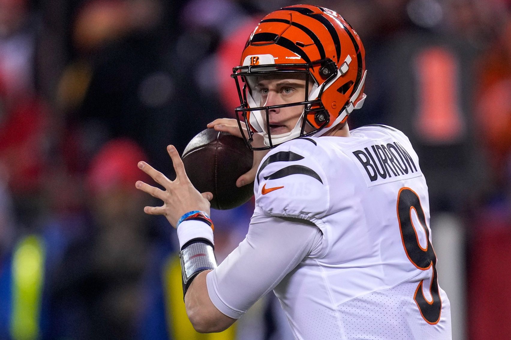 Cincinnati Bengals QB Joe Burrow (9) drops back to pass in the AFC Championship Game against Kansas City.