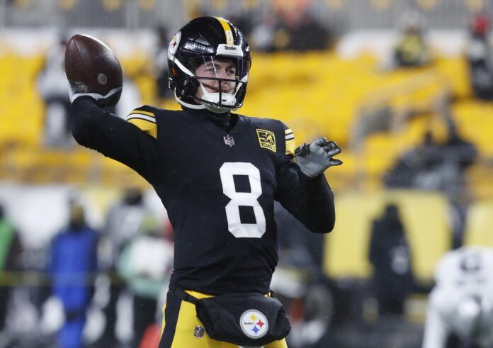 Kenny Pickett (8) warms up before the game against the Las Vegas Raiders at Acrisure Stadium.