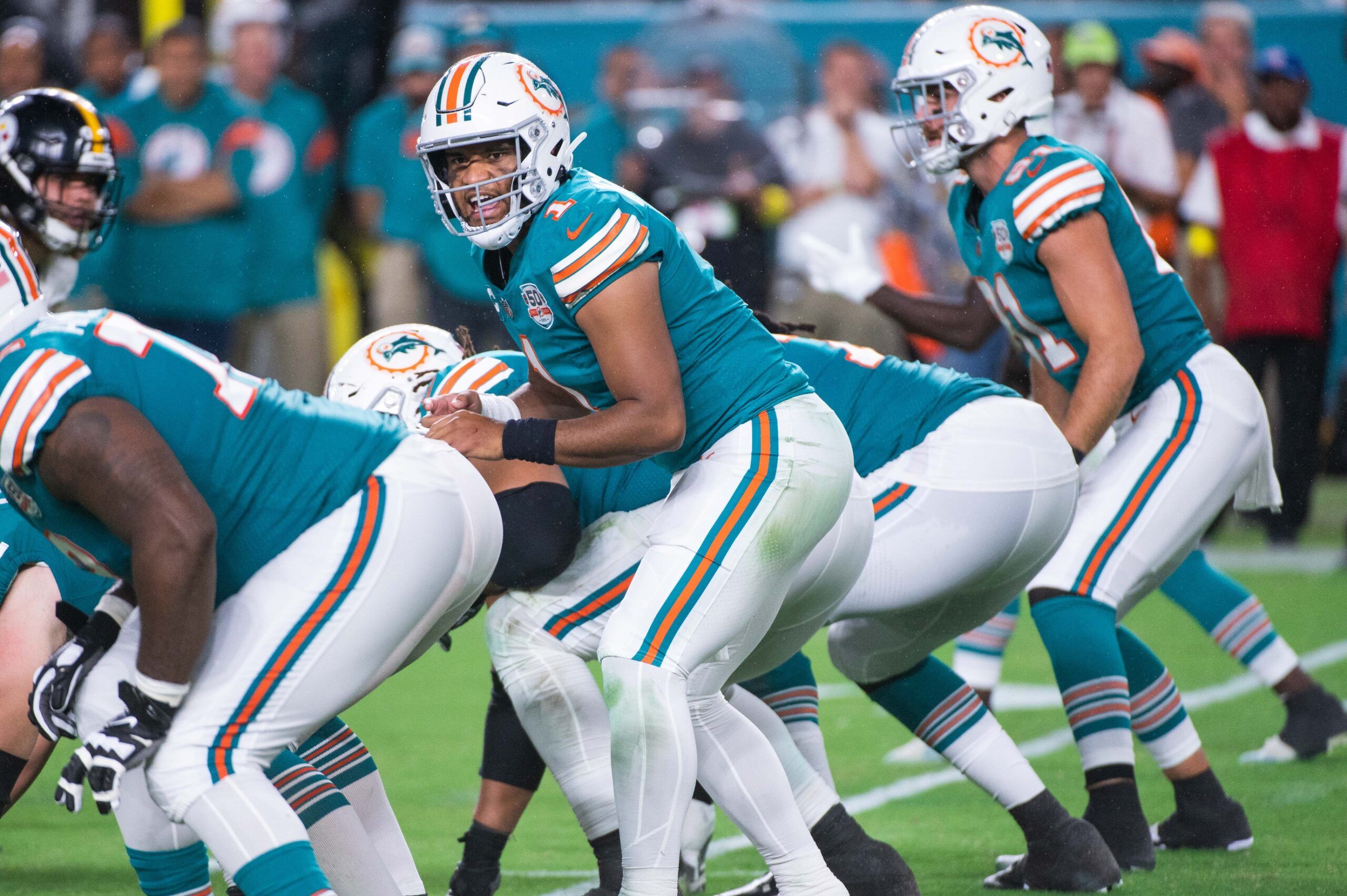 Tua Tagovailoa (1) yells from the line of scrimmage during the game between the visiting Pittsburgh Steelers and host Miami Dolphins at Hard Rock Stadium.