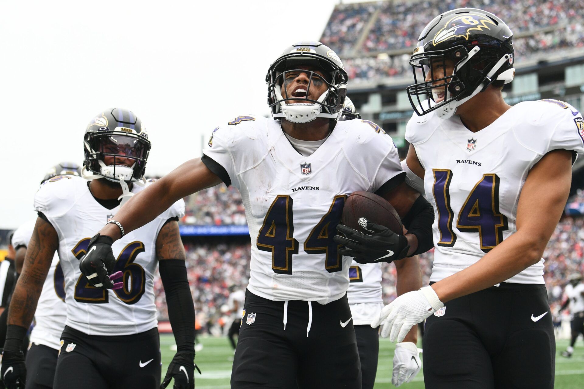 Marlon Humphrey (44) celebrates after intercepting a pass thrown by New England Patriots quarterback Mac Jones (not seen) during the second half at Gillette Stadium.