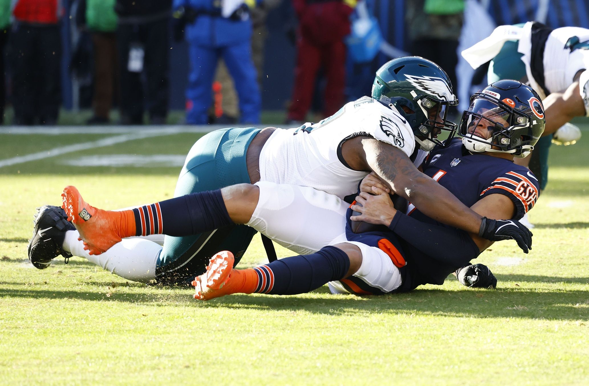 Philadelphia Eagles defensive tackle Javon Hargrave (97) sacks Chicago Bears quarterback Justin Fields.