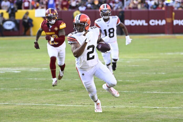 Amari Cooper (2) runs after a catch against the Washington Commanders during the second half at FedExField.