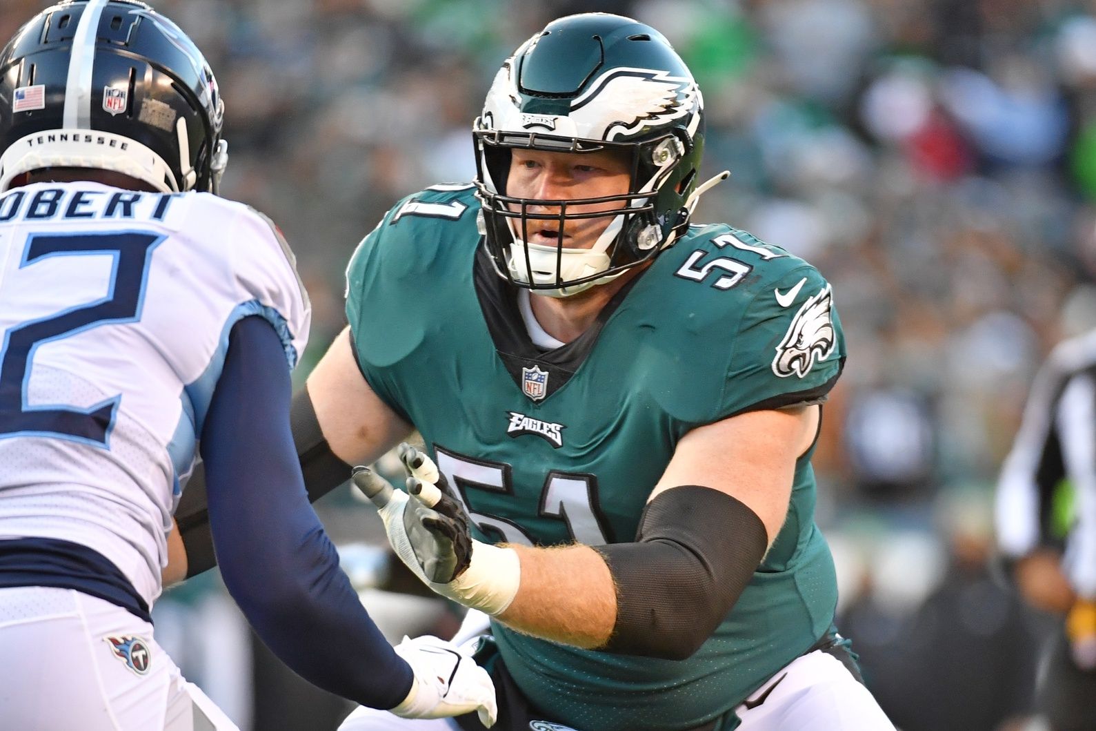 Cam Jurgens (51) blocks against the Tennessee Titans at Lincoln Financial Field.