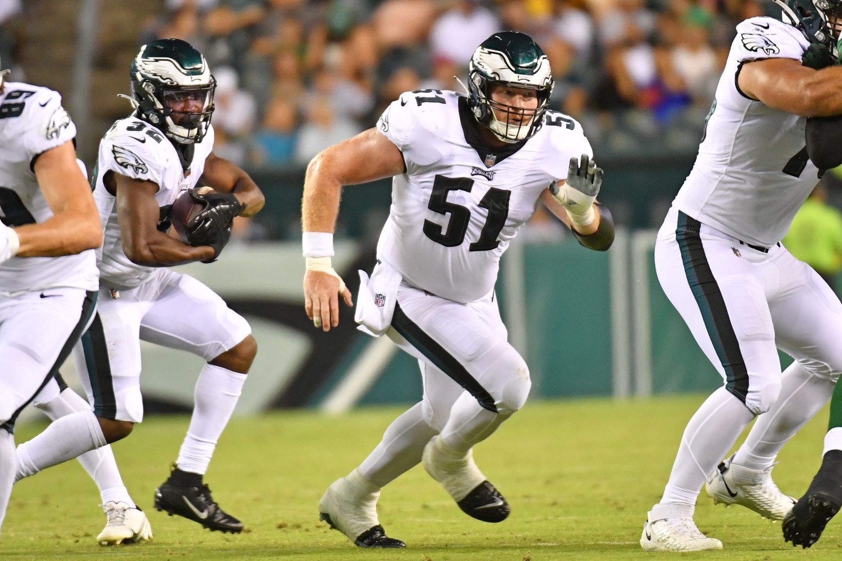 Cam Jurgens (51) blocks against the New York Jets at Lincoln Financial Field.