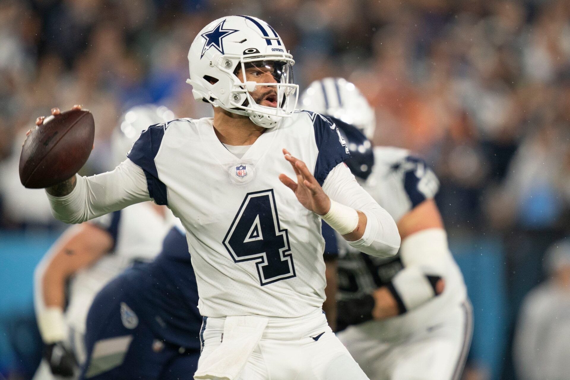 Dak Prescott (4) throws a pass during the first quarter against the Tennessee Titans at Nissan Stadium.