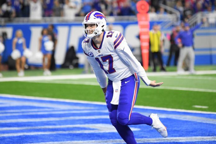 Josh Allen (17) celebrates after scoring a touchdown against the Detroit Lions in the second quarter at Ford Field.