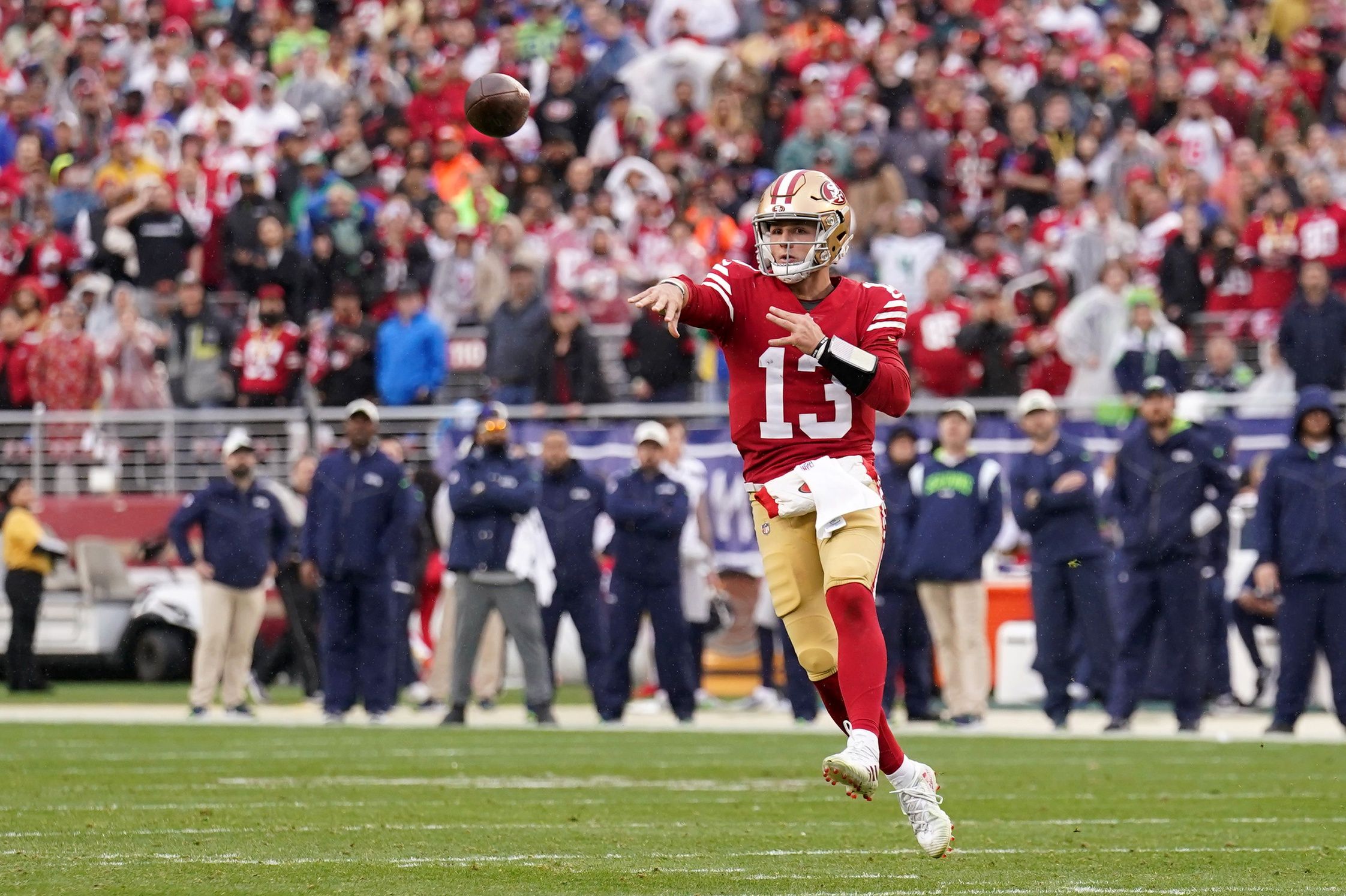 San Francisco 49ers quarterback Brock Purdy (13) makes a throw against the Seattle Seahawks in the third quarter of a wild card game at Levi's Stadium.