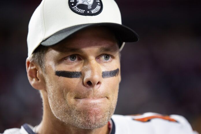 A close up of quarterback Tom Brady on the sidelines during a game against Arizona.