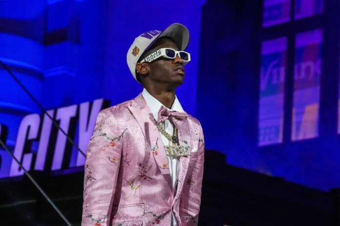 Jordan Addison reacts after being selected by the Minnesota Vikings twenty third overall in the first round of the 2023 NFL Draft at Union Station.