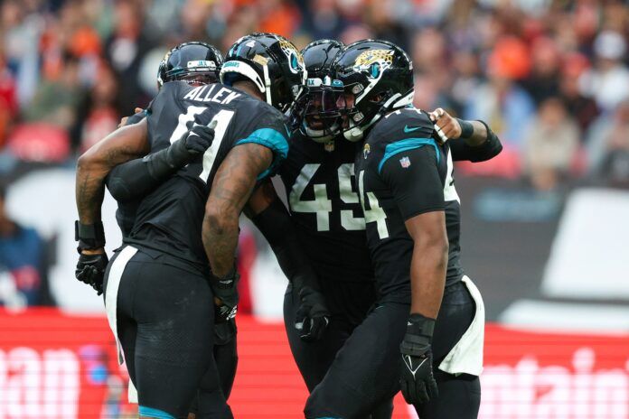 Jacksonville Jaguars defenders celebrate after a play against Denver in London.