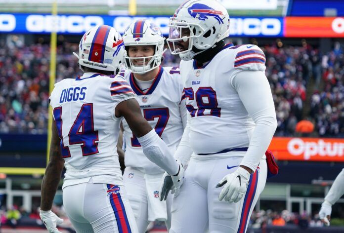 Buffalo Bills QB Josh Allen (17) and WR Stefon Diggs (14) celebrate after a touchdown.