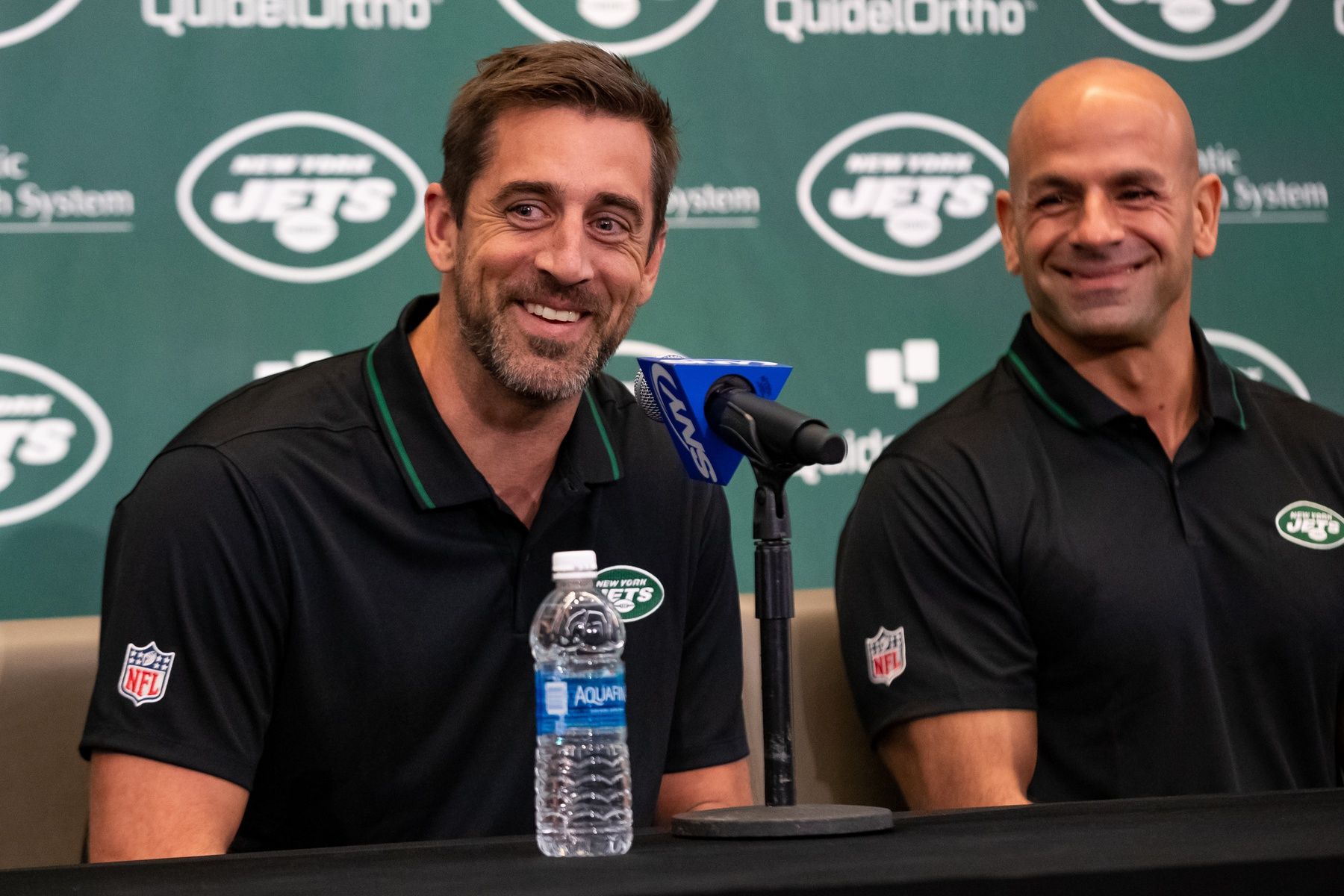 Aaron Rodgers (8) (right) and New York Jets head coach Robert Saleh (left) address the media during the introductory press conference at Atlantic Health Jets Training Center.