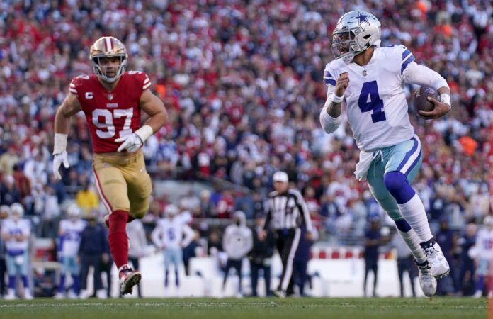 Dallas Cowboys QB Dak Prescott (4) runs with the ball against San Francisco.