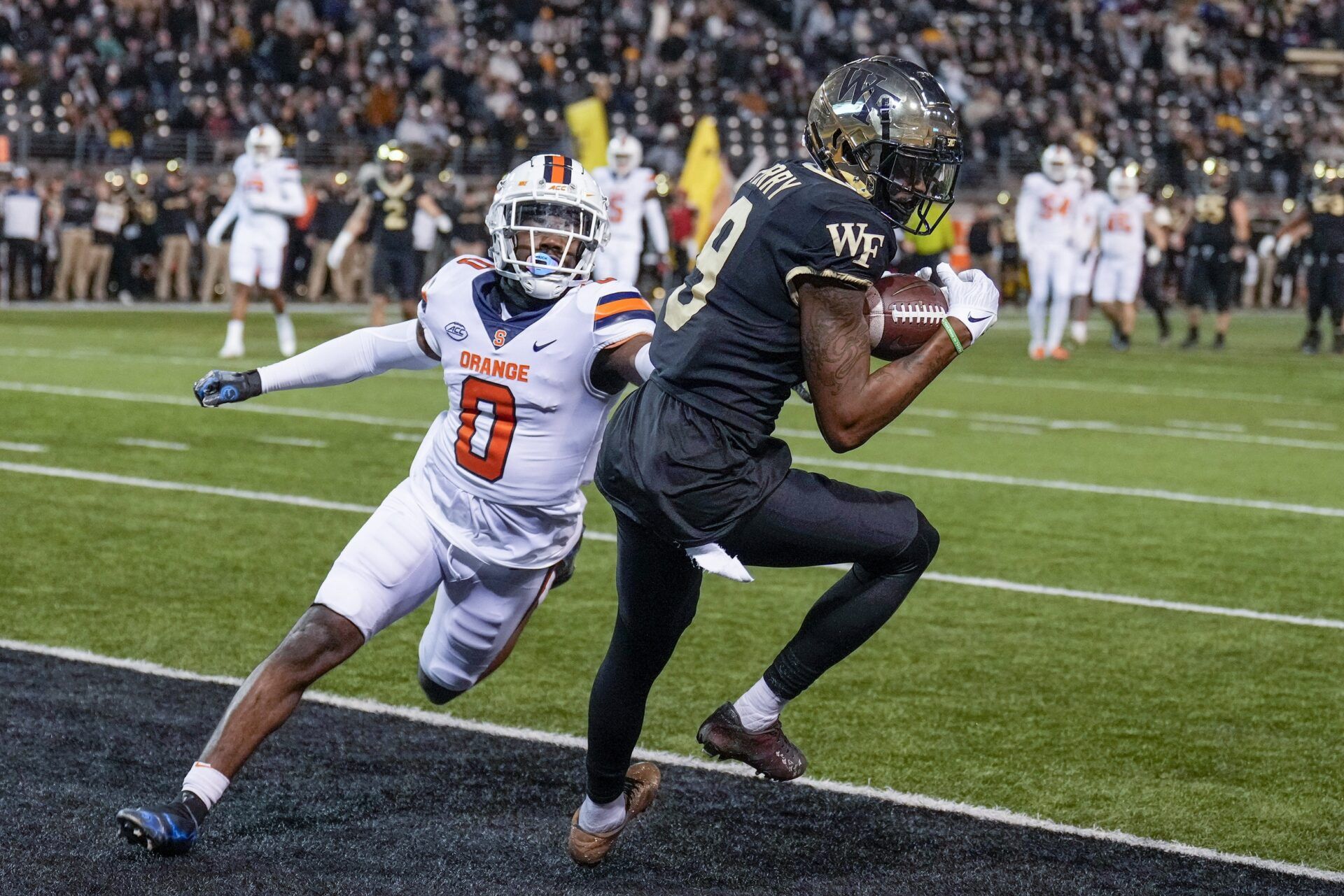 Wake Forest WR A.T. Perry (9) makes the reception for the touchdown against Syracuse.