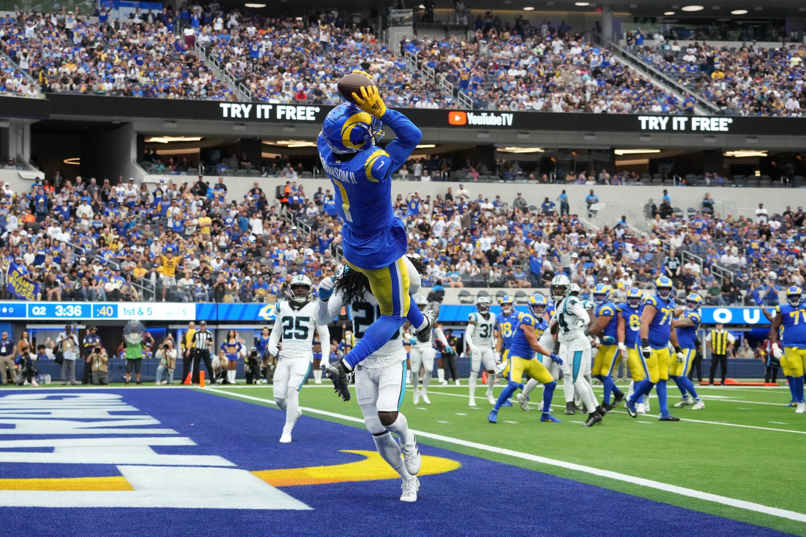 Los Angeles Rams wide receiver Allen Robinson II (1) catches a touchdown pass in the second quarter against the Carolina Panthers at SoFi Stadium. 