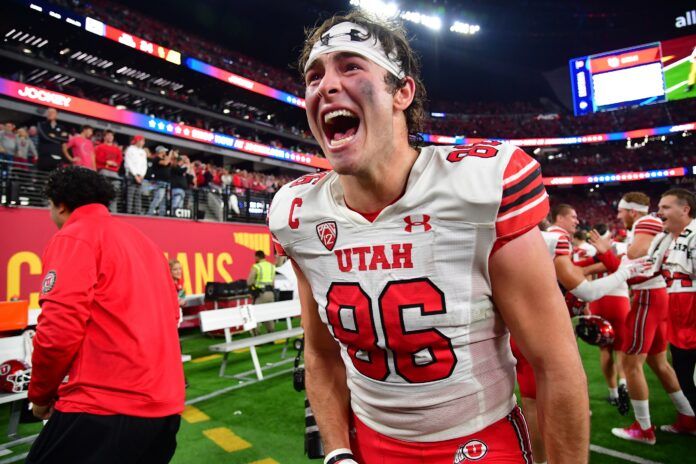 Dalton Kincaid (86) celebrates the victory against the Southern California Trojans in the PAC-12 Football Championship at Allegiant Stadium.