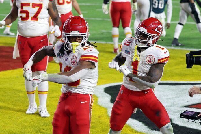 Chiefs running back Isiah Pacheco (10) celebrates with running back Jerick McKinnon (1) after scoring a touchdown in the third quarter of Super Bowl LVII.