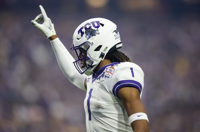 Quentin Johnston (1) against the Michigan Wolverines during the 2022 Fiesta Bowl at State Farm Stadium.