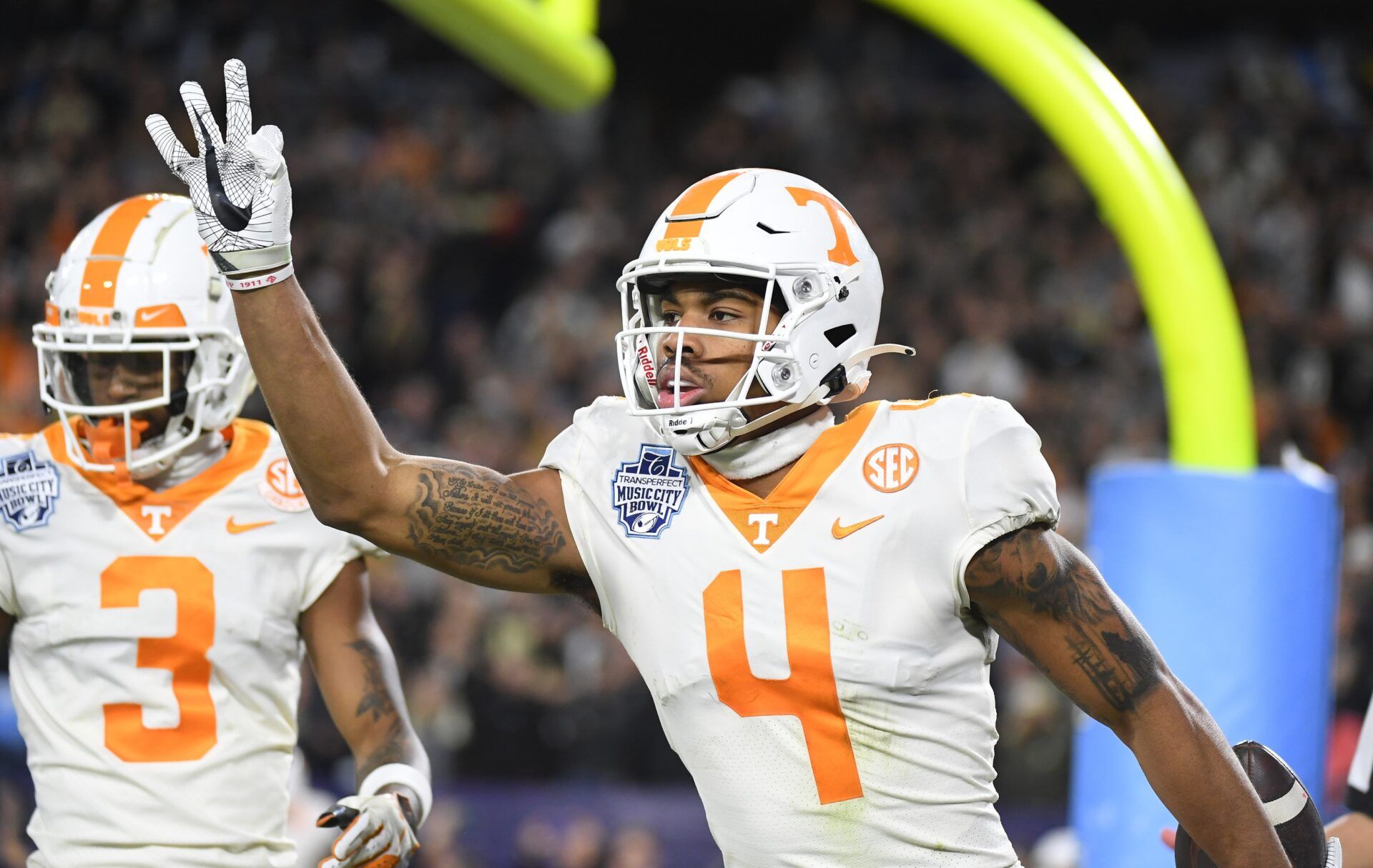 Tennessee WR Cedric Tillman (4) celebrates after scoring a touchdown.