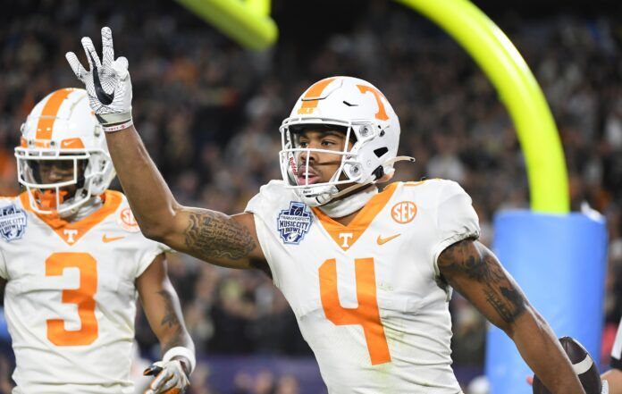 Tennessee WR Cedric Tillman (4) celebrates after scoring a touchdown.