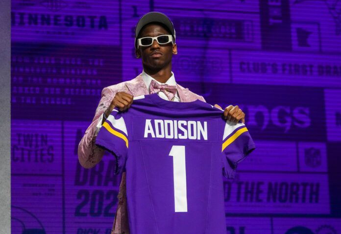 USC wide receiver Jordan Addison on stage after being selected by the Minnesota Vikings twenty third overall in the first round of the 2023 NFL Draft at Union Station.