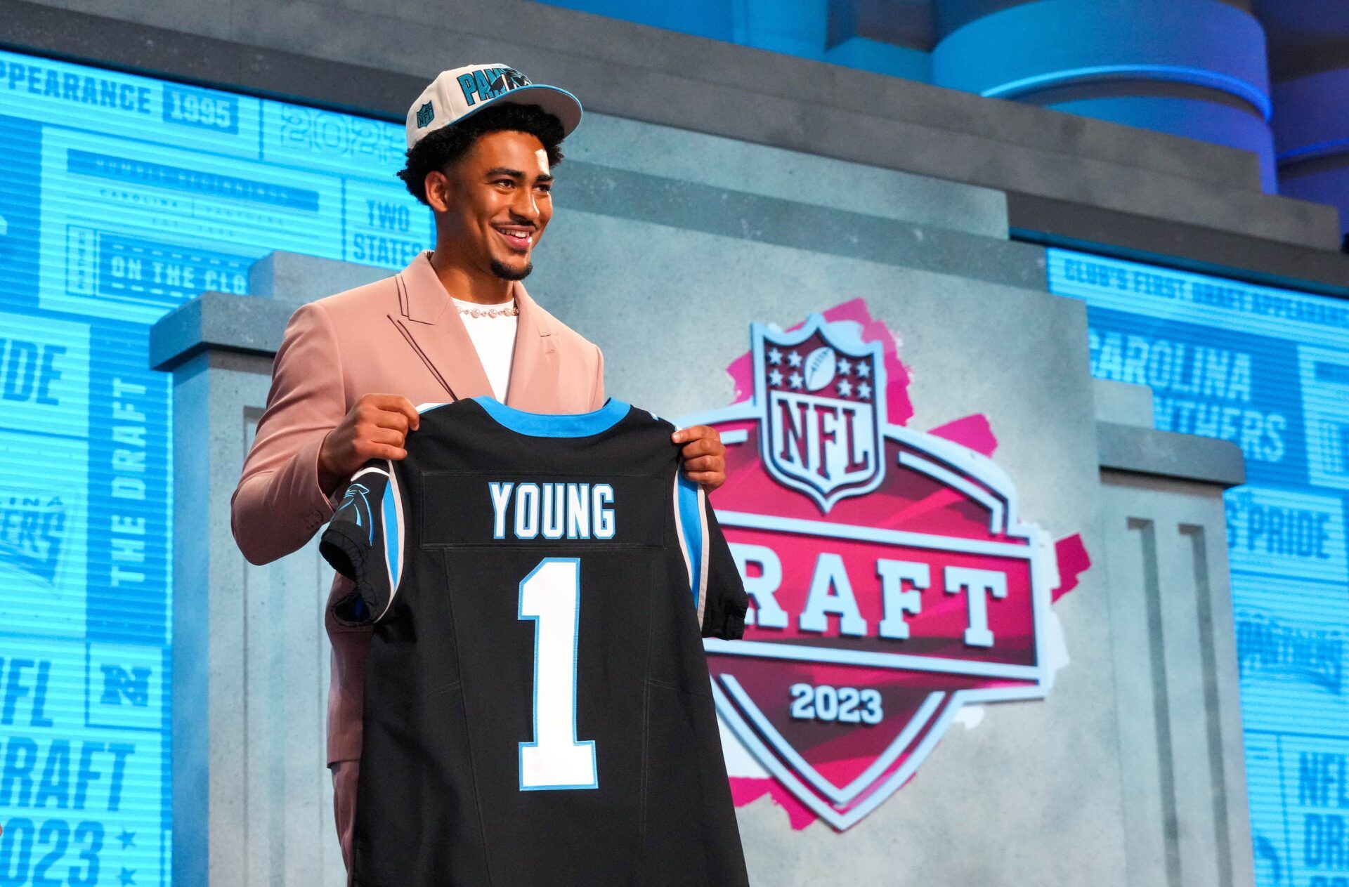 Alabama quarterback Bryce Young on stage after he was drafted first overall by the Carolina Panthers in the first round.