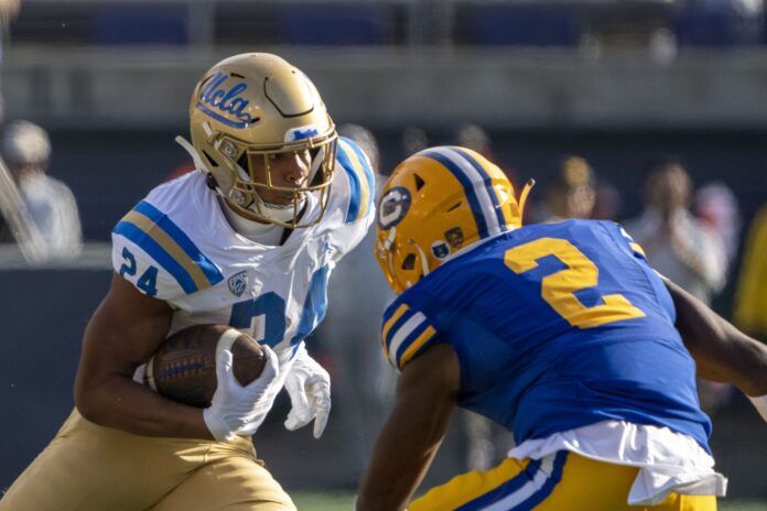 UCLA RB Zach Charbonnet (24) runs the ball against California.