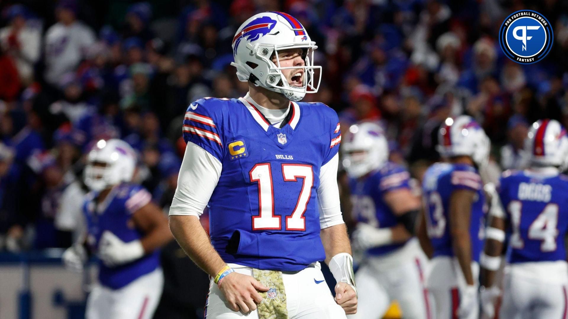 Buffalo Bills quarterback Josh Allen (17) celebrates his 81 yard touchdown pass to Buffalo Bills wide receiver Khalil Shakir (10).