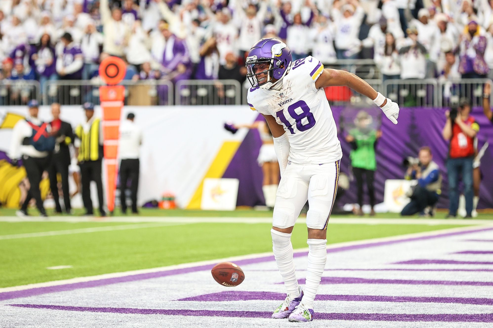 Justin Jefferson (18) celebrates his touchdown against the New York Giants during the fourth quarter at U.S. Bank Stadium. 