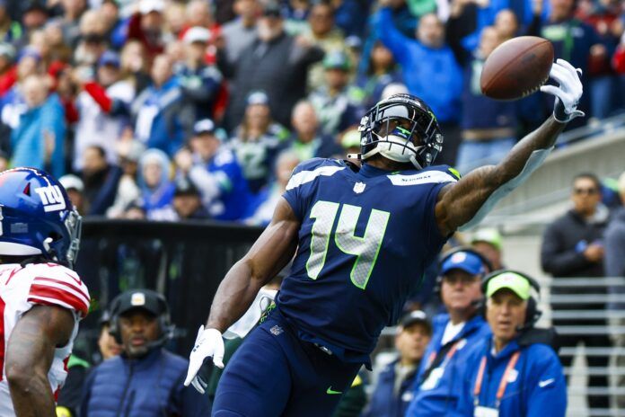 DK Metcalf (14) fails to catch a pass against the New York Giants during the first quarter at Lumen Field.