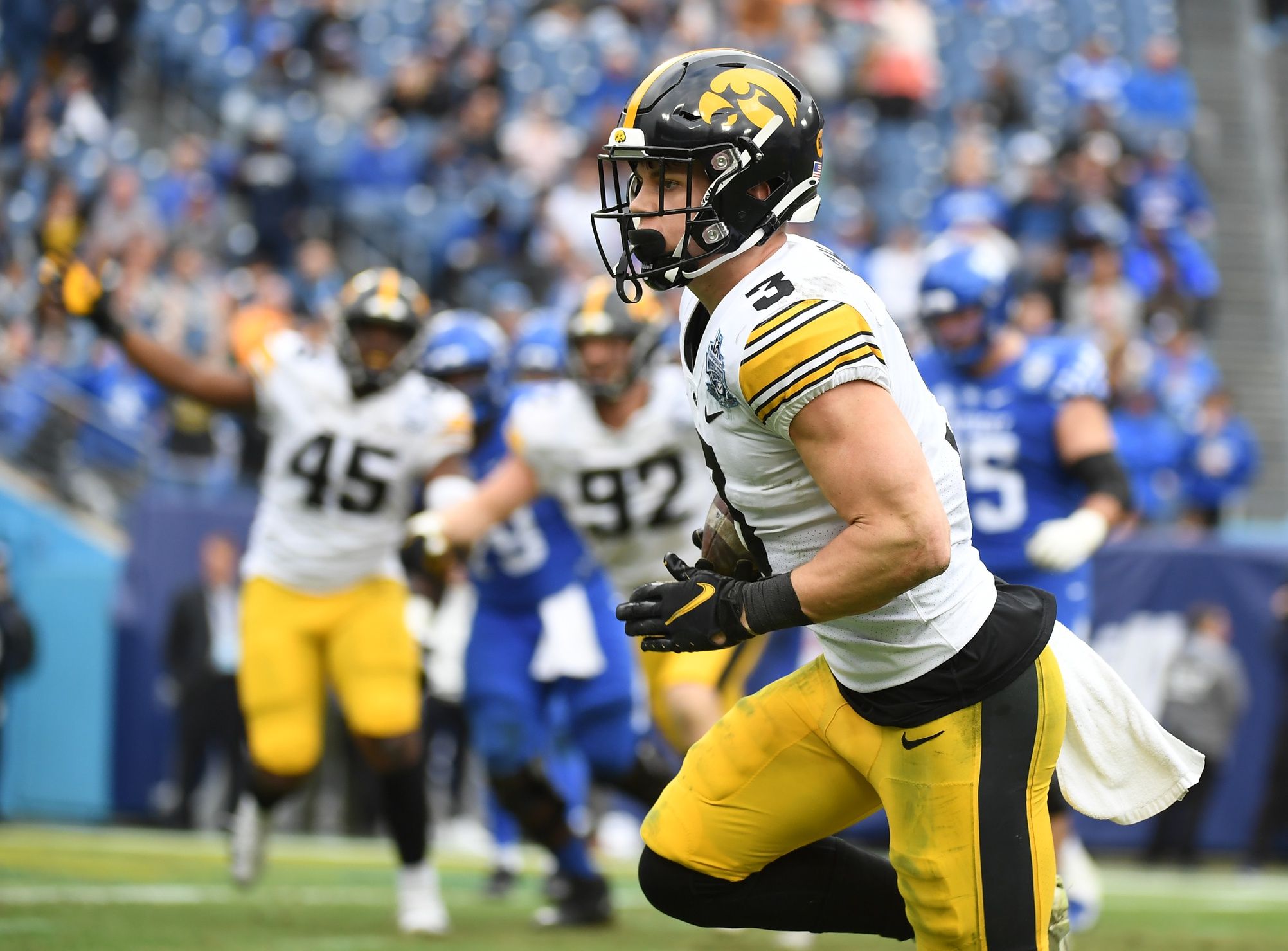 Cooper DeJean (3) returns an interception for a touchdown during the first half against the Kentucky Wildcats in the 2022 Music City Bowl at Nissan Stadium. 