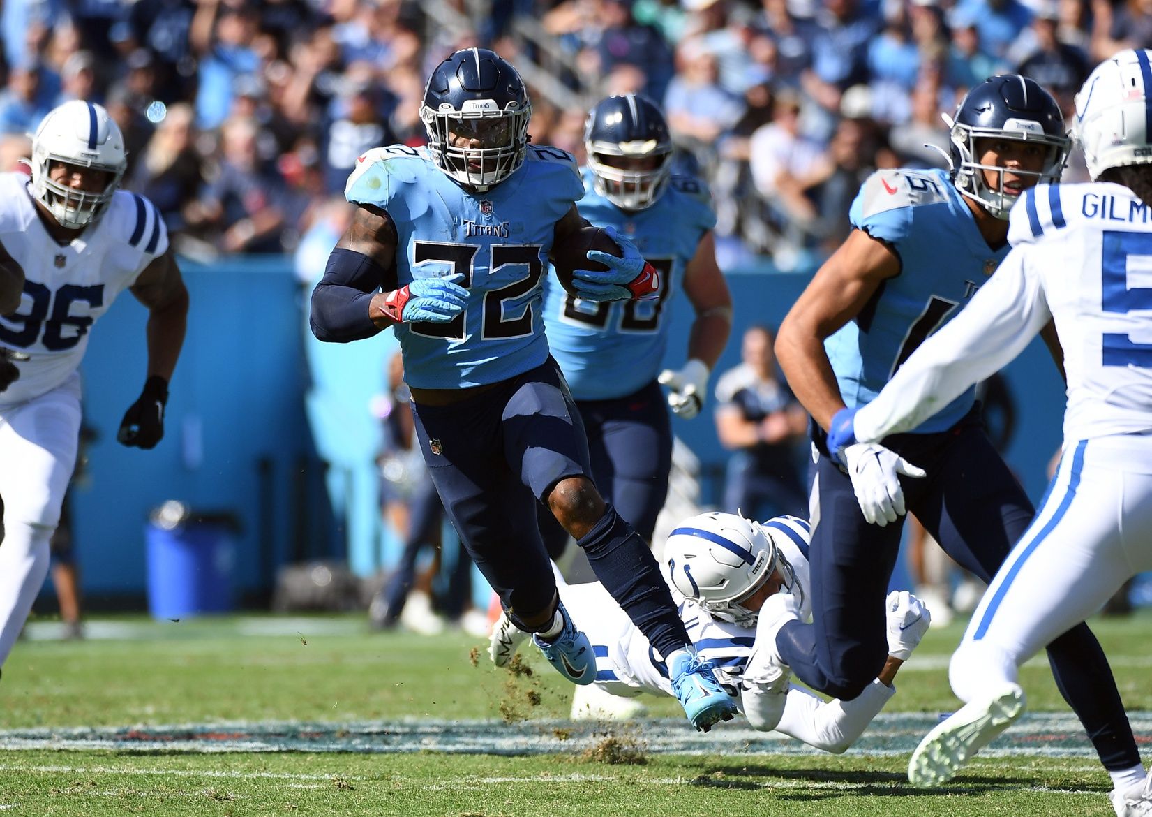 Derrick Henry (22) runs for a first down during the first half against the Indianapolis Colts at Nissan Stadium.