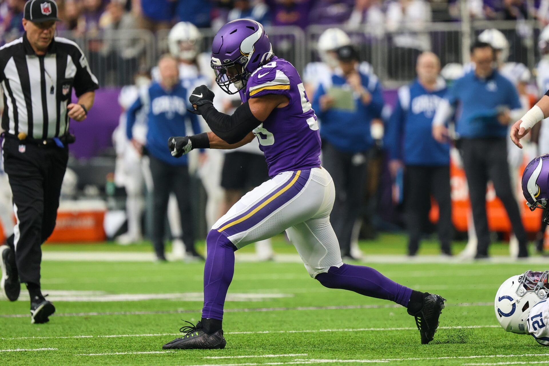 Jordan Hicks (58) celebrates a stop against the Indianapolis Colts during the first quarter at U.S. Bank Stadium.