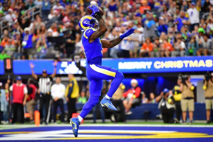 Cam Akers (3) celebrates his touchdown scored against the Denver Broncos during the first half at SoFi Stadium.