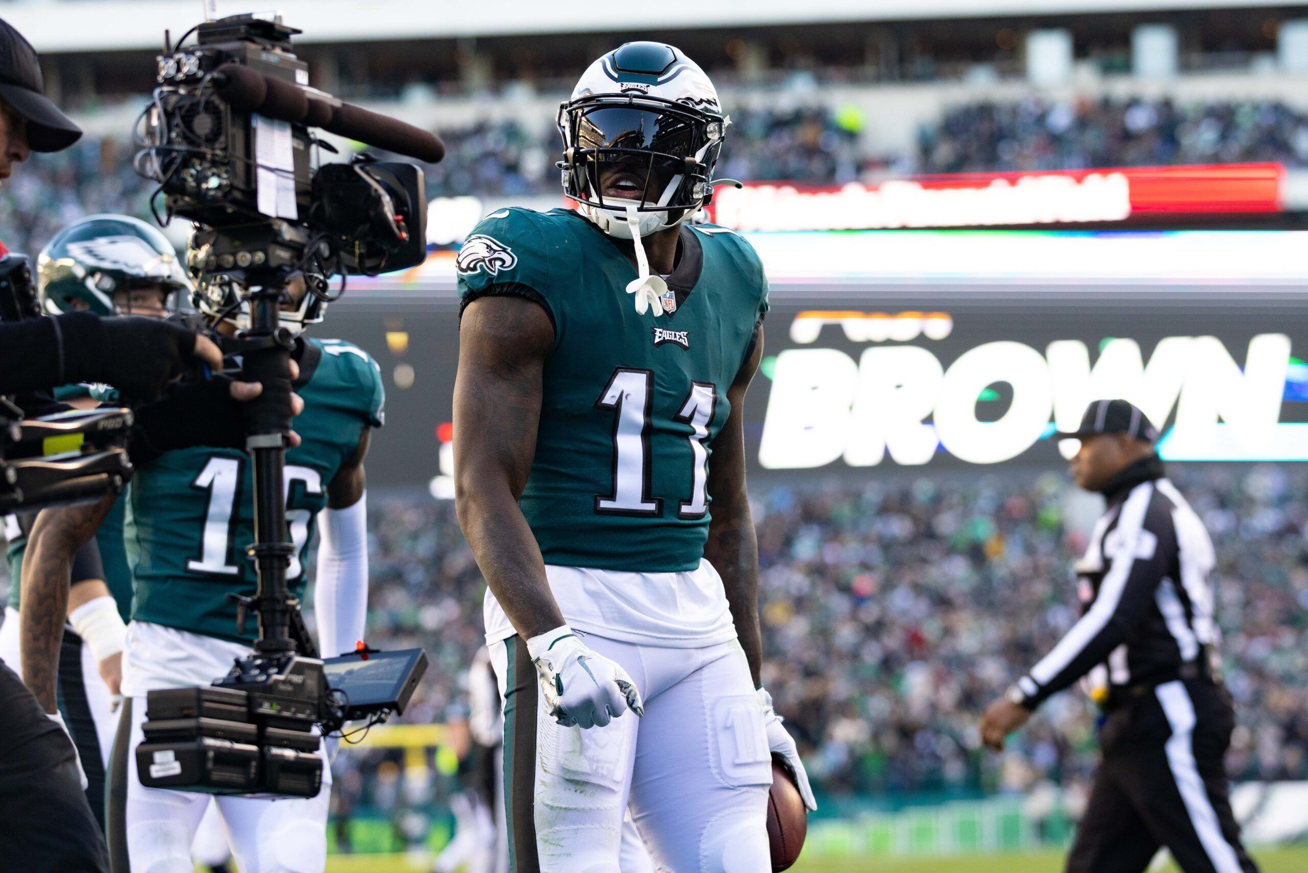 A.J. Brown (11) celebrates his touchdown catch against the Tennessee Titans during the third quarter at Lincoln Financial Field.