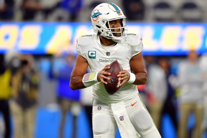 Tua Tagovailoa (1) drops back to pass against the Los Angeles Chargers during the second half at SoFi Stadium.