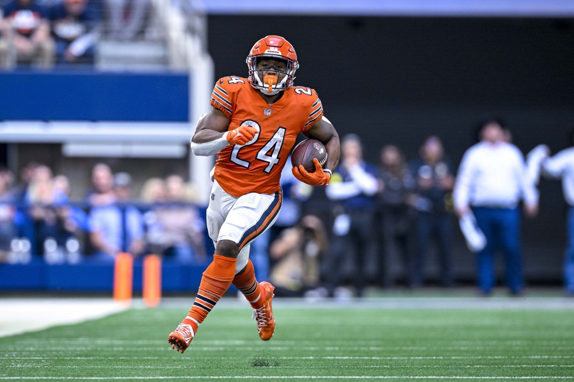 Khalil Herbert (24) runs for a first down against the Dallas Cowboys during the second half at AT&T Stadium.