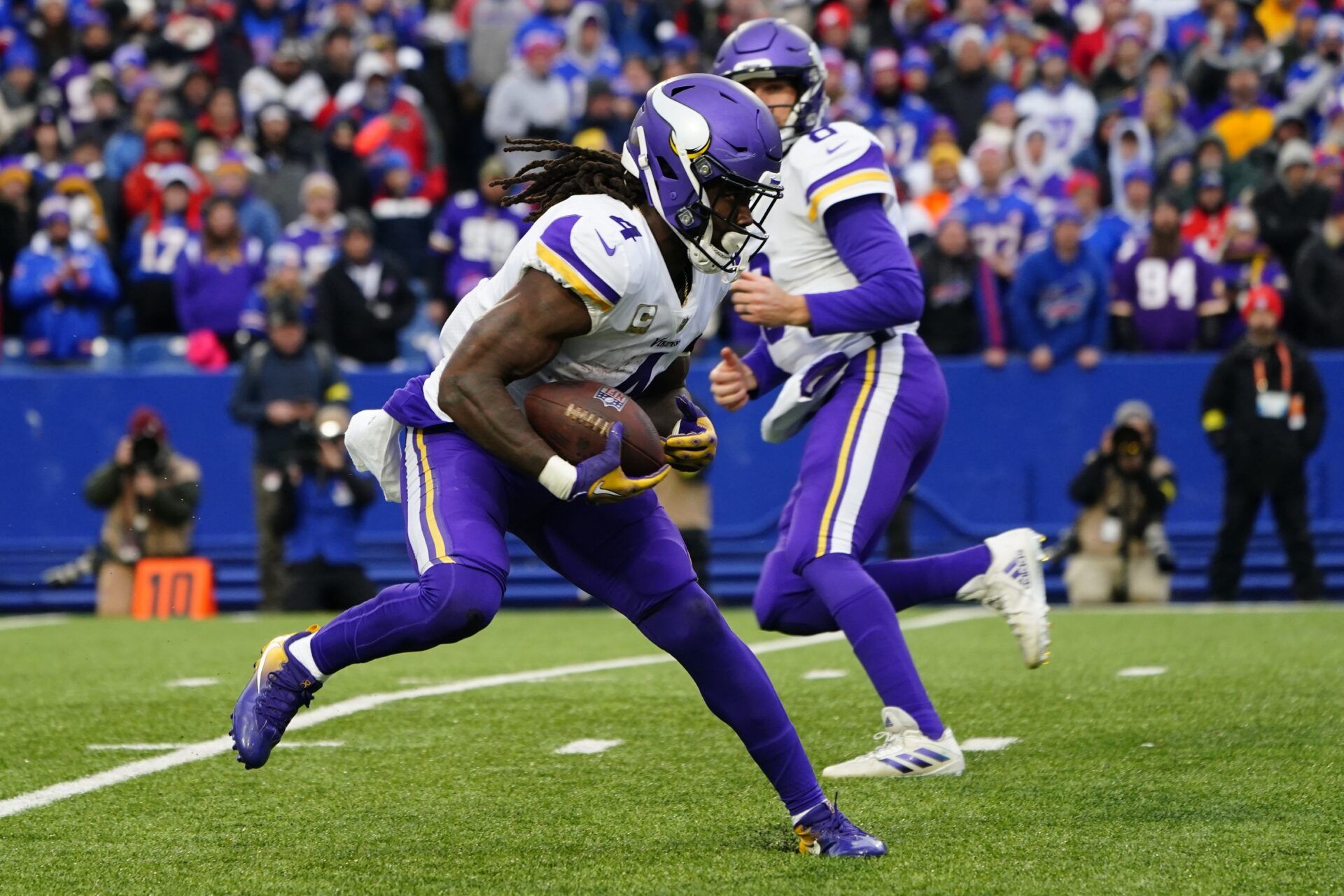 Dalvin Cook (4) runs with the ball against the Buffalo Bills during second half at Highmark Stadium.