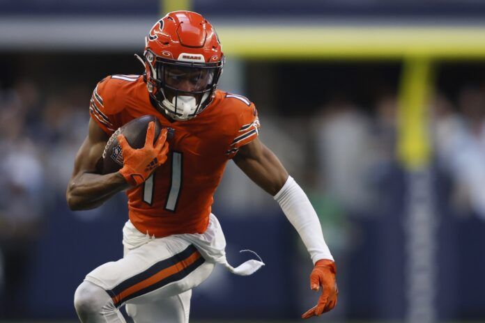 Chicago Bears WR Darnell Mooney (11) runs with the ball against the Dallas Cowboys.