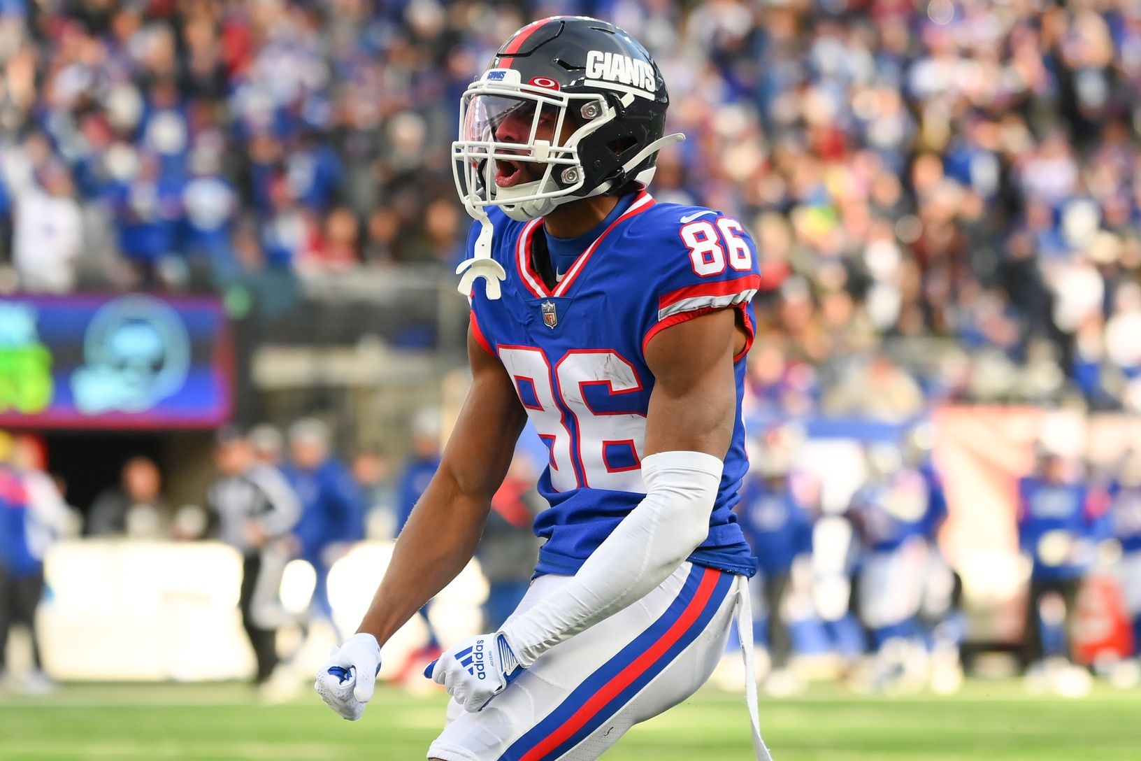 Darius Slayton (86) reacts to a play against the Washington Commanders during the first half at MetLife Stadium.