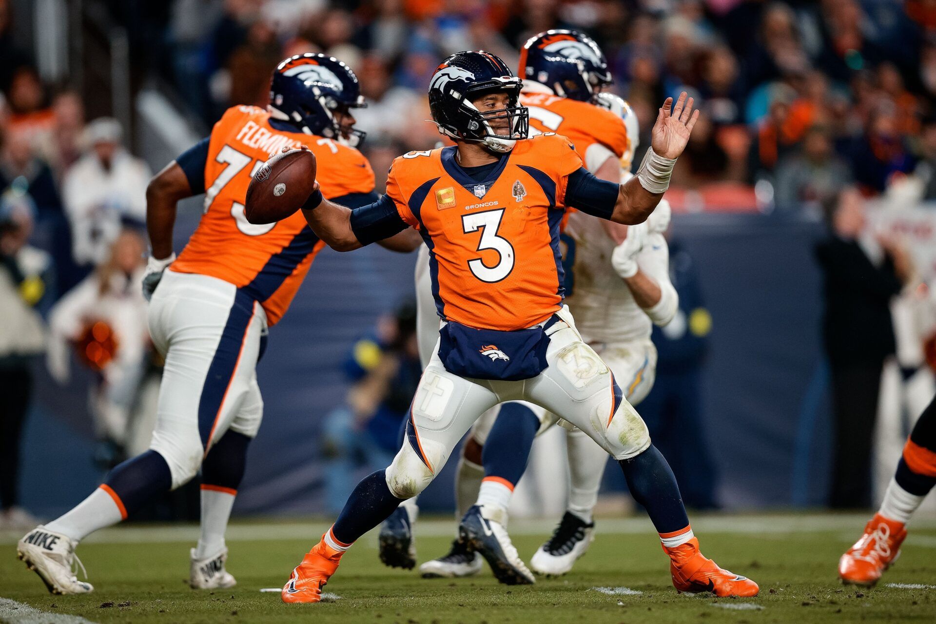 Denver Broncos QB Russell Wilson (3) throws a pass against the Los Angeles Chargers.