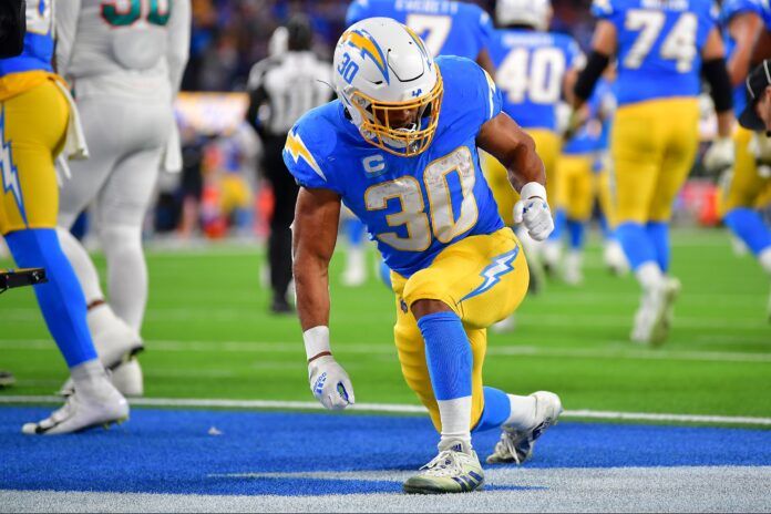 Austin Ekeler (30) celebrates his touchdown scored against the Miami Dolphins during the first half at SoFi Stadium.