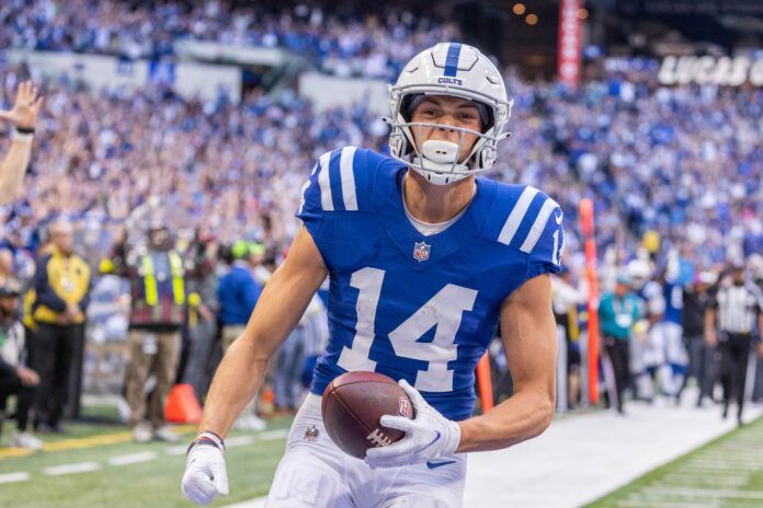 Alec Pierce (14) celebrates his winning touchdown in the second half against the Jacksonville Jaguars at Lucas Oil Stadium.