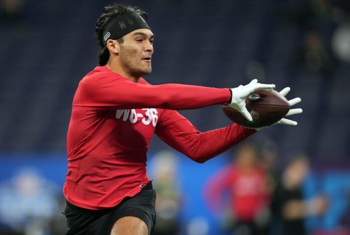 Puka Nacua (WO36) participates in drills at Lucas Oil Stadium.