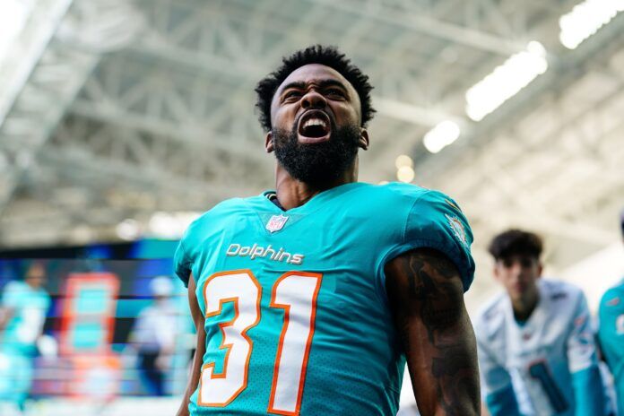 Raheem Mostert (31) enters the field prior to a game against the New York Jets at Hard Rock Stadium.