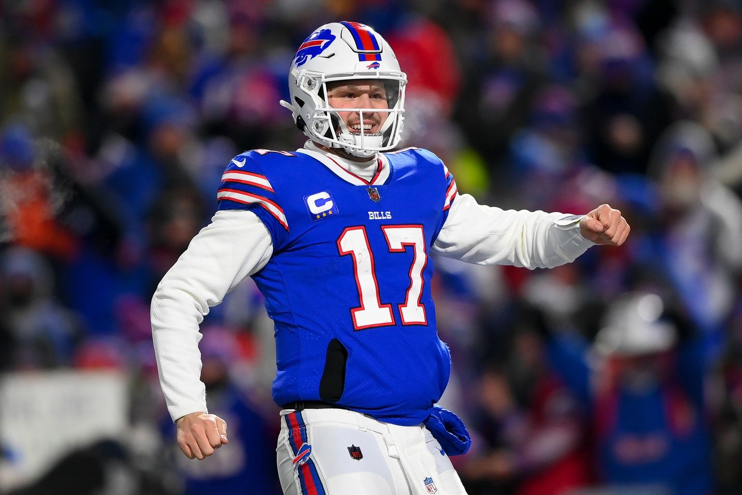 Josh Allen (17) reacts to a touchdown during the second half.