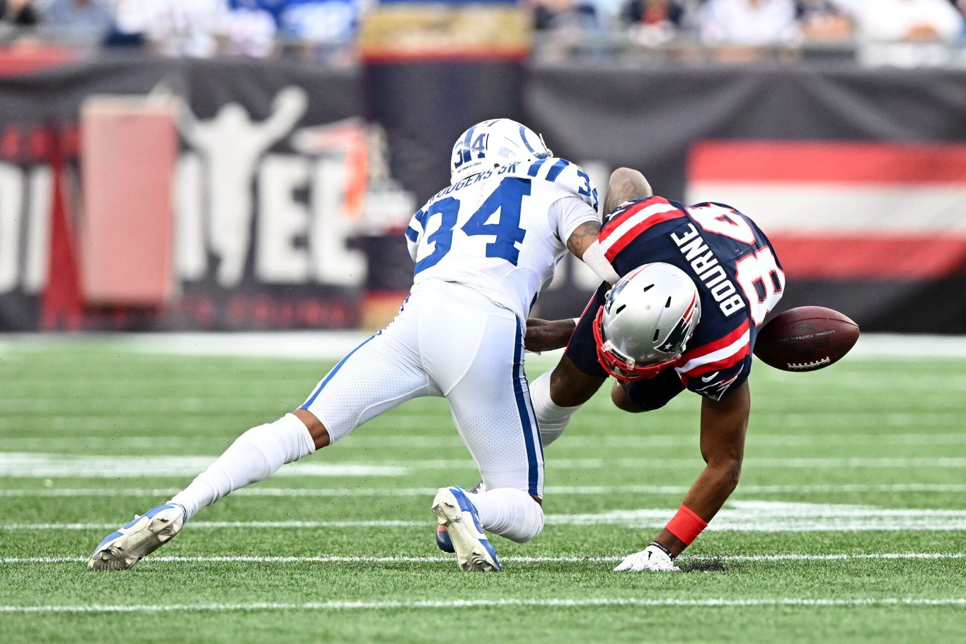 Indianapolis Colts DB Isaiah Rodgers forces a fumble on New England Patriots WR Kendrick Bourne (84).