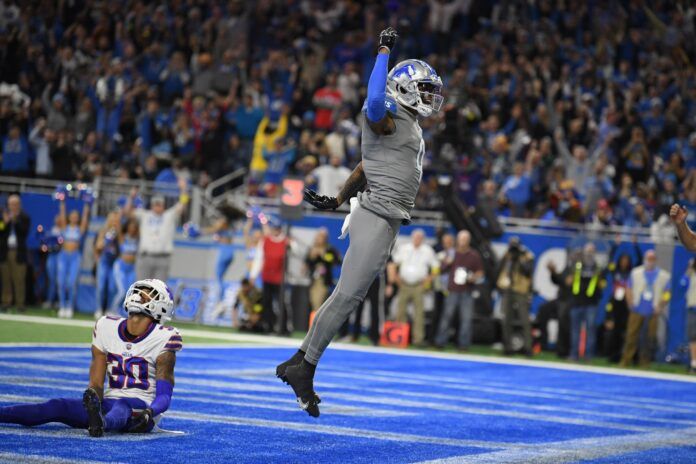 DJ Chark (4) celebrates after catching a touchdown pass from quarterback Jared Goff.