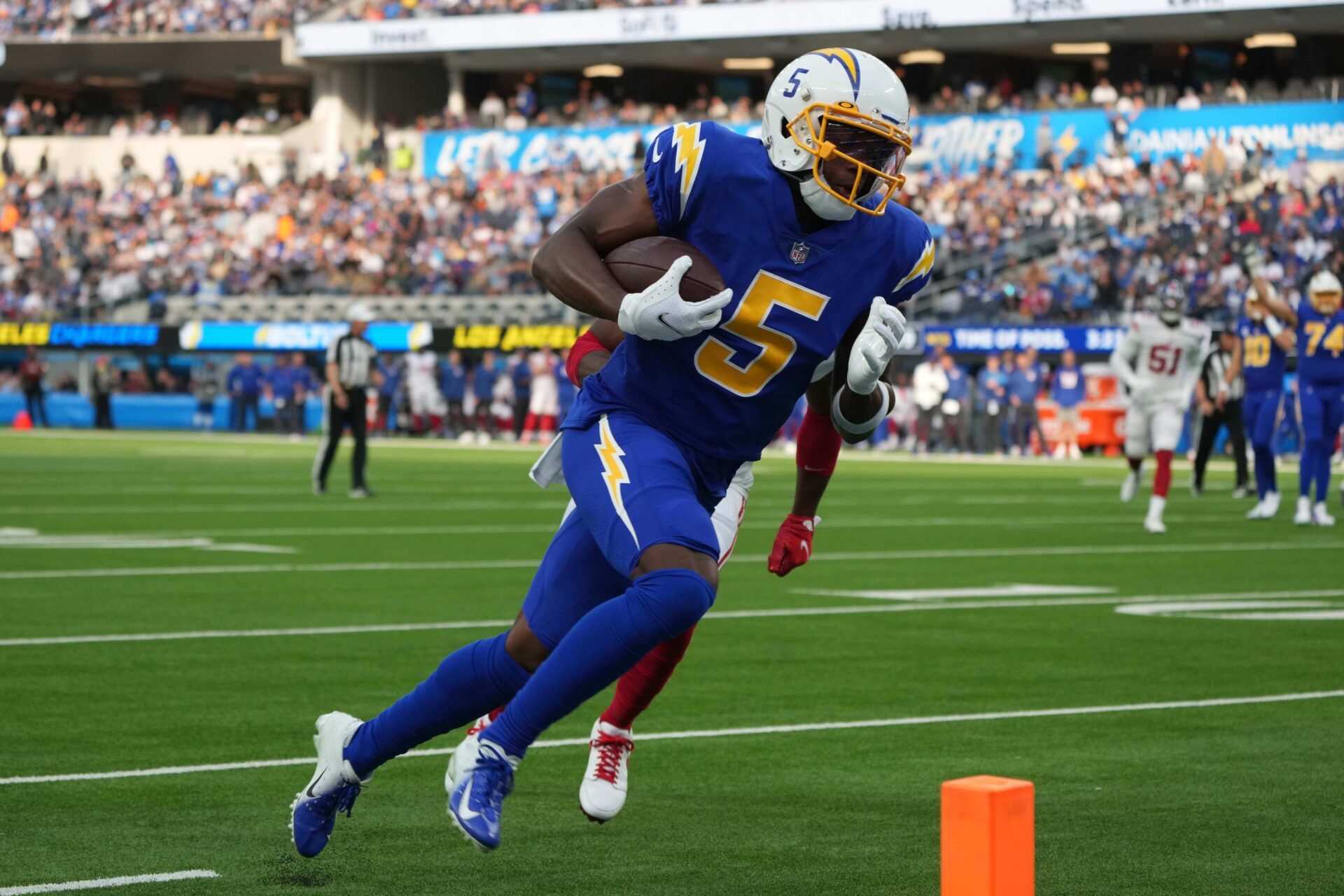 Los Angeles Chargers WR Josh Palmer (5) runs into the end zone for a touchdown against the New York Giants.