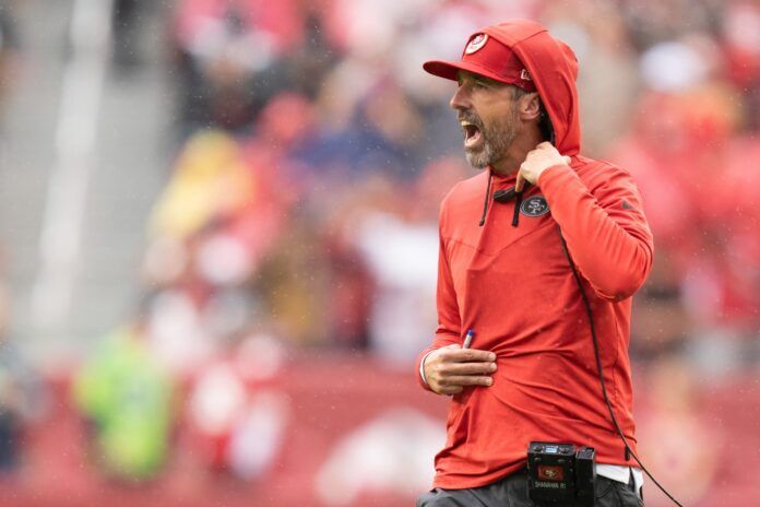 San Francisco 49ers head coach Kyle Shanahan argues with the referee against the Seattle Seahawks during the fourth quarter.